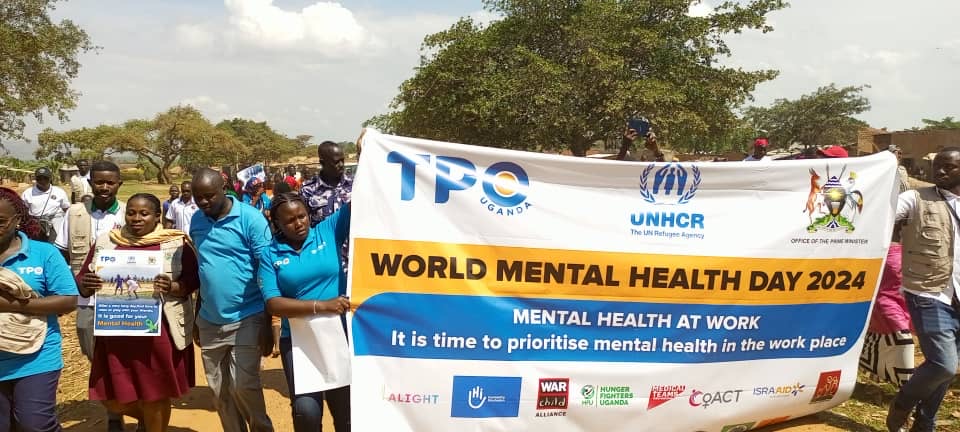 TpoUg's tweet photo. In #NakivaleRefugeeSettlement #SouthWesternUganda @TpoUg field-based teams joined partners including @UNHCRuganda @CBS__Rwanda @icbs_connect @WarChildCan @Tutapona @OPMUganda @RefugeesUganda to commemorate the day #ImprovingMentalHealthAtWork #30YearsofTransforminglives https://t.co/m7JraJnsVq
