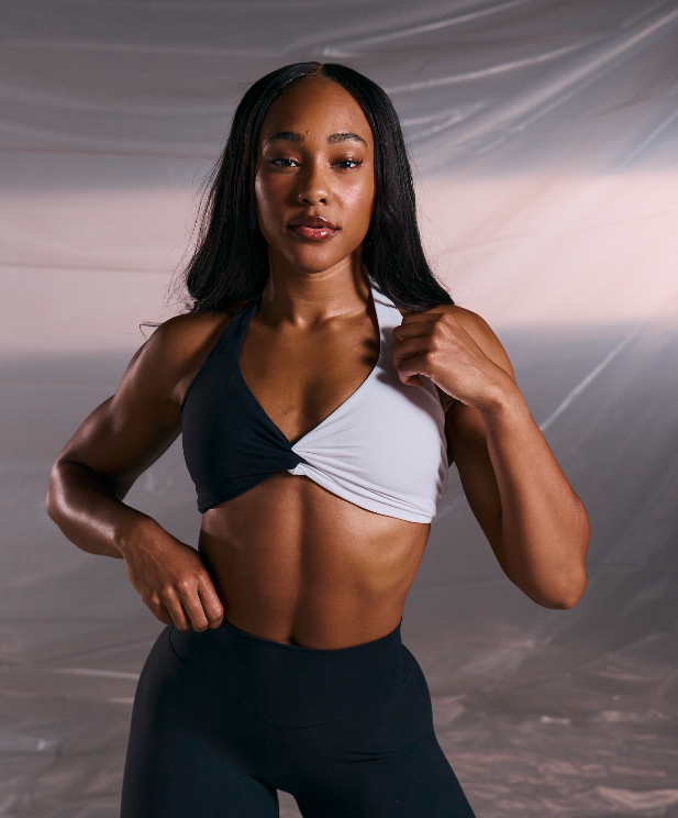 Buffbunny_Co's tweet photo. When your sports bra is cute and functional—it’s a win-win! 🖤🤍

Our two toned Poshknit Twist Halter is available NOW on our website!

#buffbunnycollection https://t.co/HpTGfCkENd