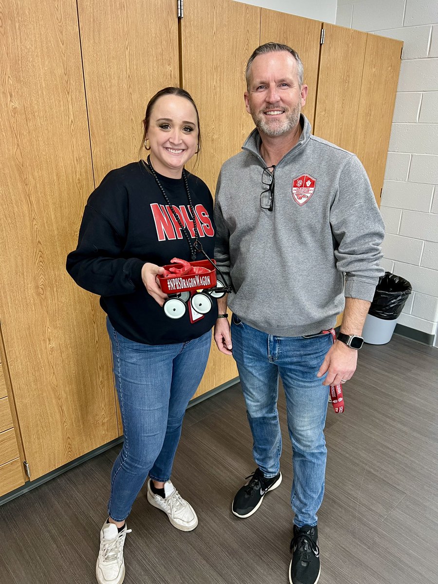 Today, Mr Moore passed the <a href="/NPHSDragonWagon/">Dragon Wagon</a> to Miss Natalie!

He praised her positive impact on our entire building. As the NPHS social worker, she’s created great bonds with students &amp; supports the staff in many ways!

<a href="/VoelzJames/">New Palestine High School</a> <a href="/MooreNPJH/">NPHS Asst. Principal & Girls Varsity 🏀 Coach</a> <a href="/BurkNPHS/">Mitch Burk</a> <a href="/ginapleak/">Gina Pleak, Ph.D.</a> @SouthernHancock