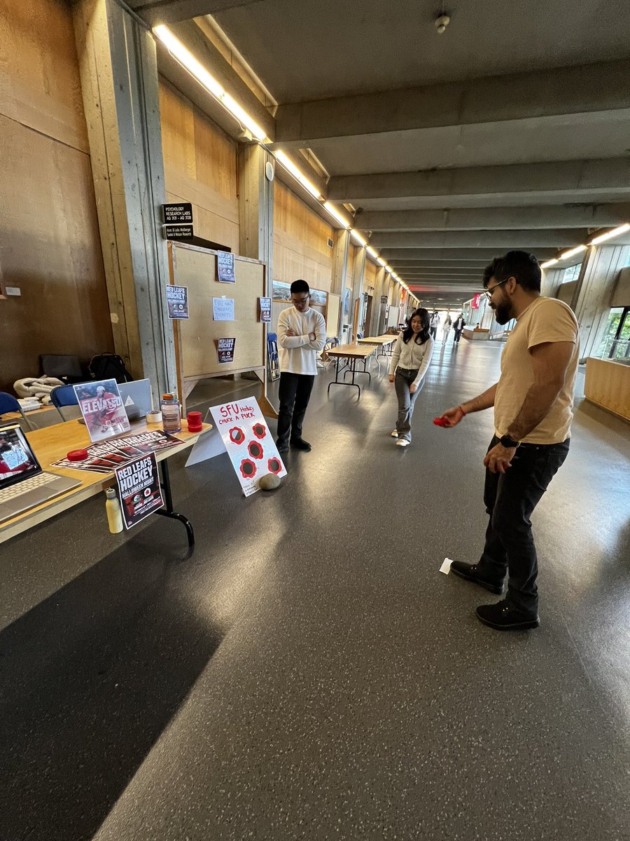 SFUHockey's tweet photo. Come visit our table on Burnaby campus on the North side of the AQ this afternoon and win some prizes! #ChuckAPuck #RepTheLeaf https://t.co/O2kz35Knmn