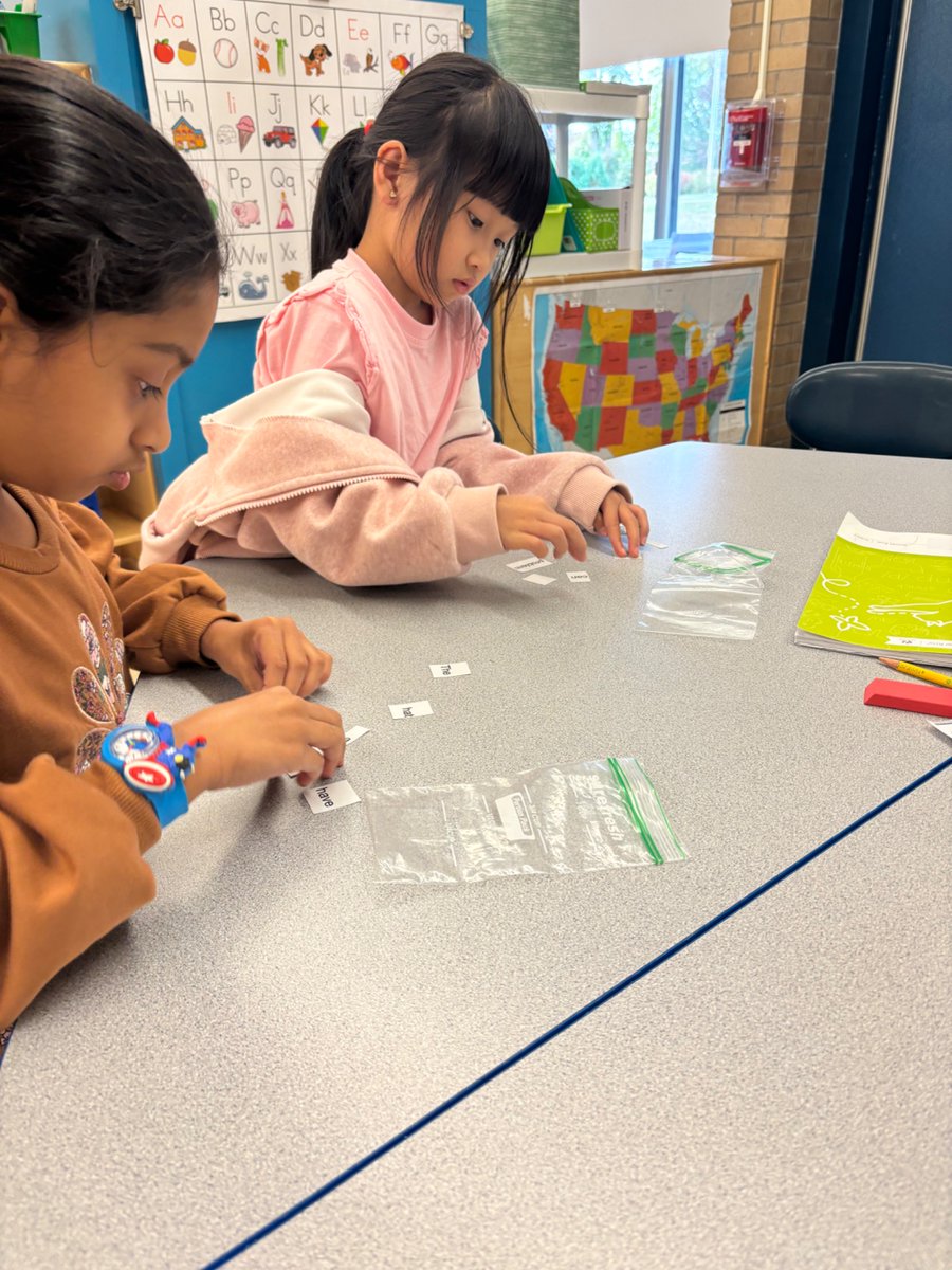 My 2nd grade ELLs unscrambling sentences using strategies I taught them! Bravo!