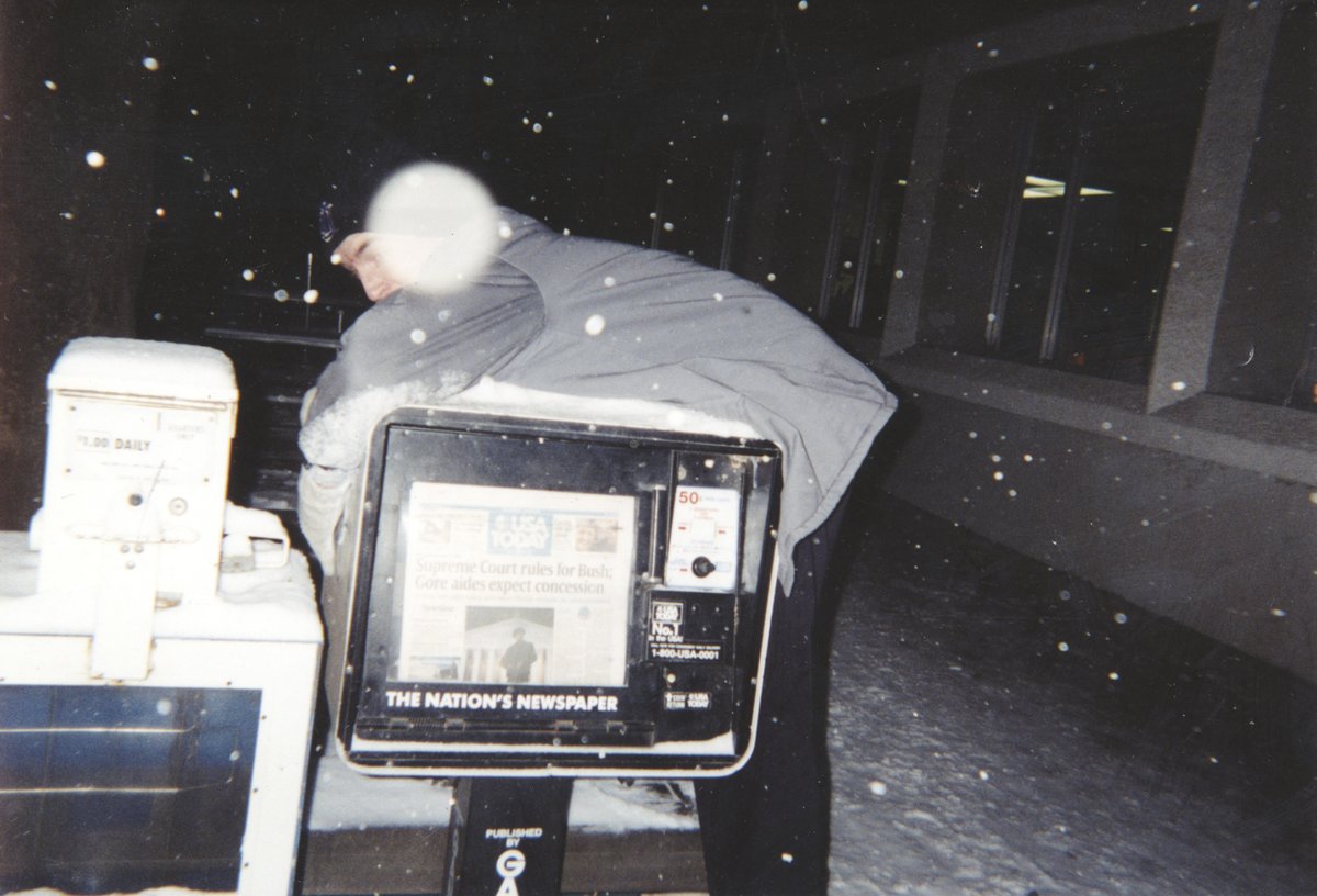 73sand88s's tweet photo. Just scanned this picture of me mounting a newspaper machine in a snowstorm (probably in Walla Walla, Washington) and saw the historic headline about Gore v. Bush. I was able to date this to Wednesday, December 13, 2000. https://t.co/W1ME7S9cBZ