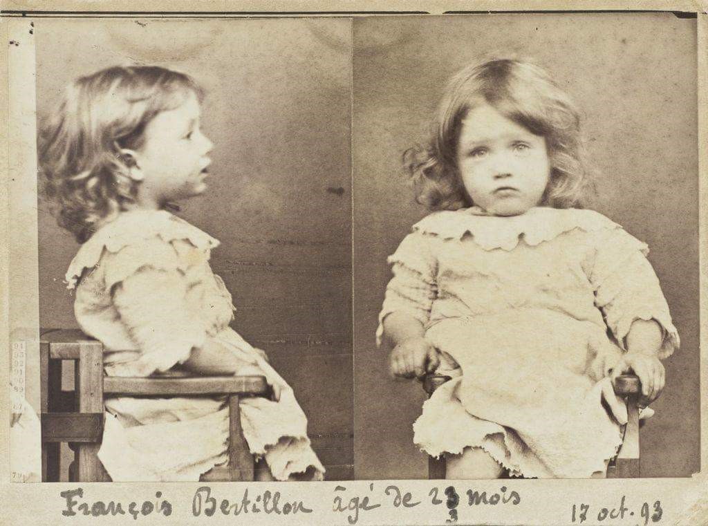 I post this every few years, just because I like it ~ Alphonse Bertillon, pioneer of the front-&amp;-profile criminal mugshot, did some practice runs with his nephew, a notoriously hardened criminal, aged 2. His crime? 'Nibbling pears' (Silver albumen print, 1893 MoMA)