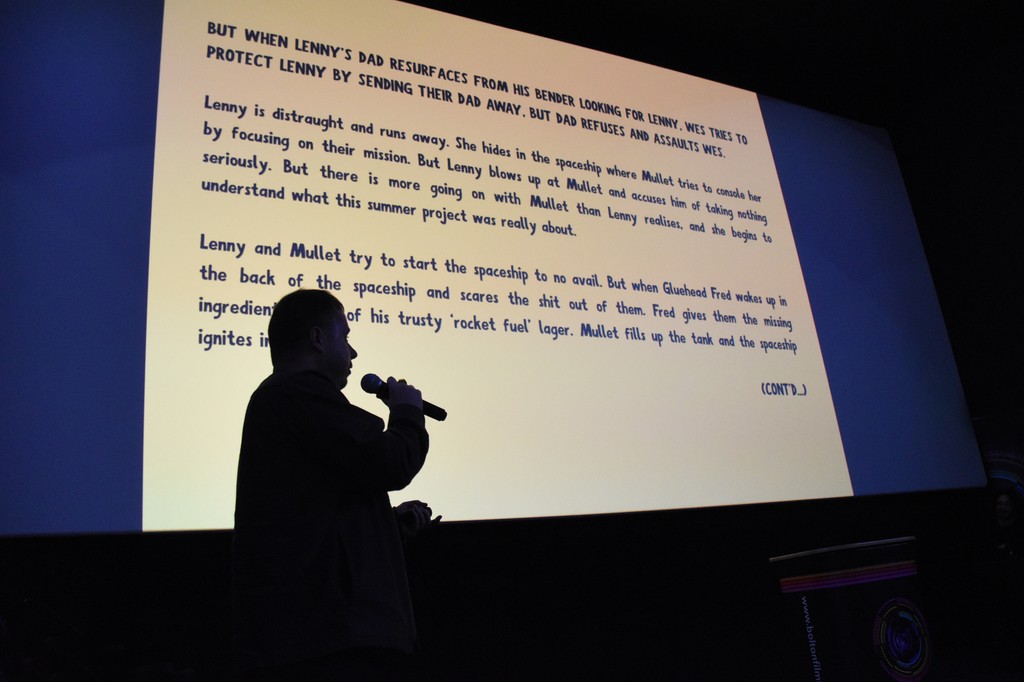AND THE WINNER IS...

🏆 Jordon Scott Kennedy for Rocket Fuel!

Rocket Fuel follows best friends Lenny and Mullet, two kids from a council estate in Bradford. They find an abandoned car and use their imaginations to build a ride to the moon.

Huge congratulations Jordon!