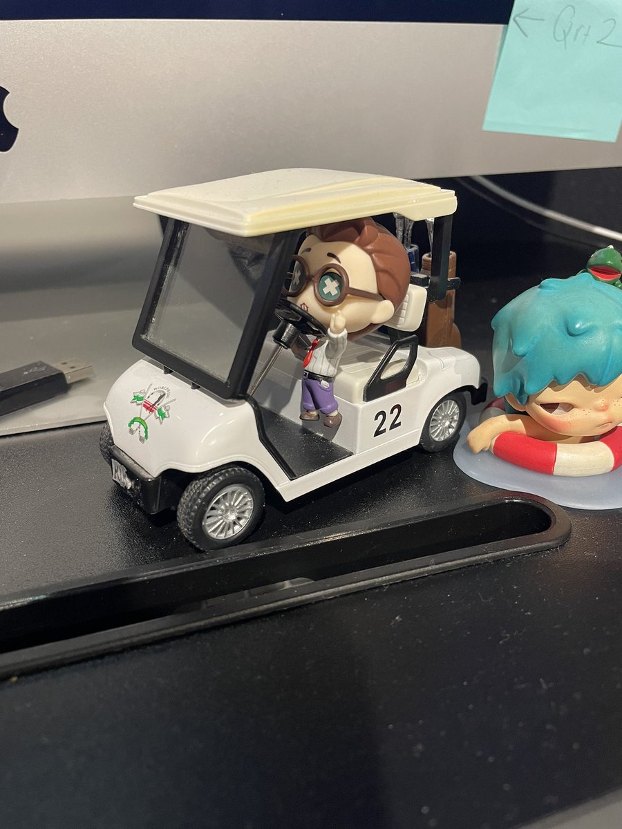emotional support freddy driving the golf cart at work