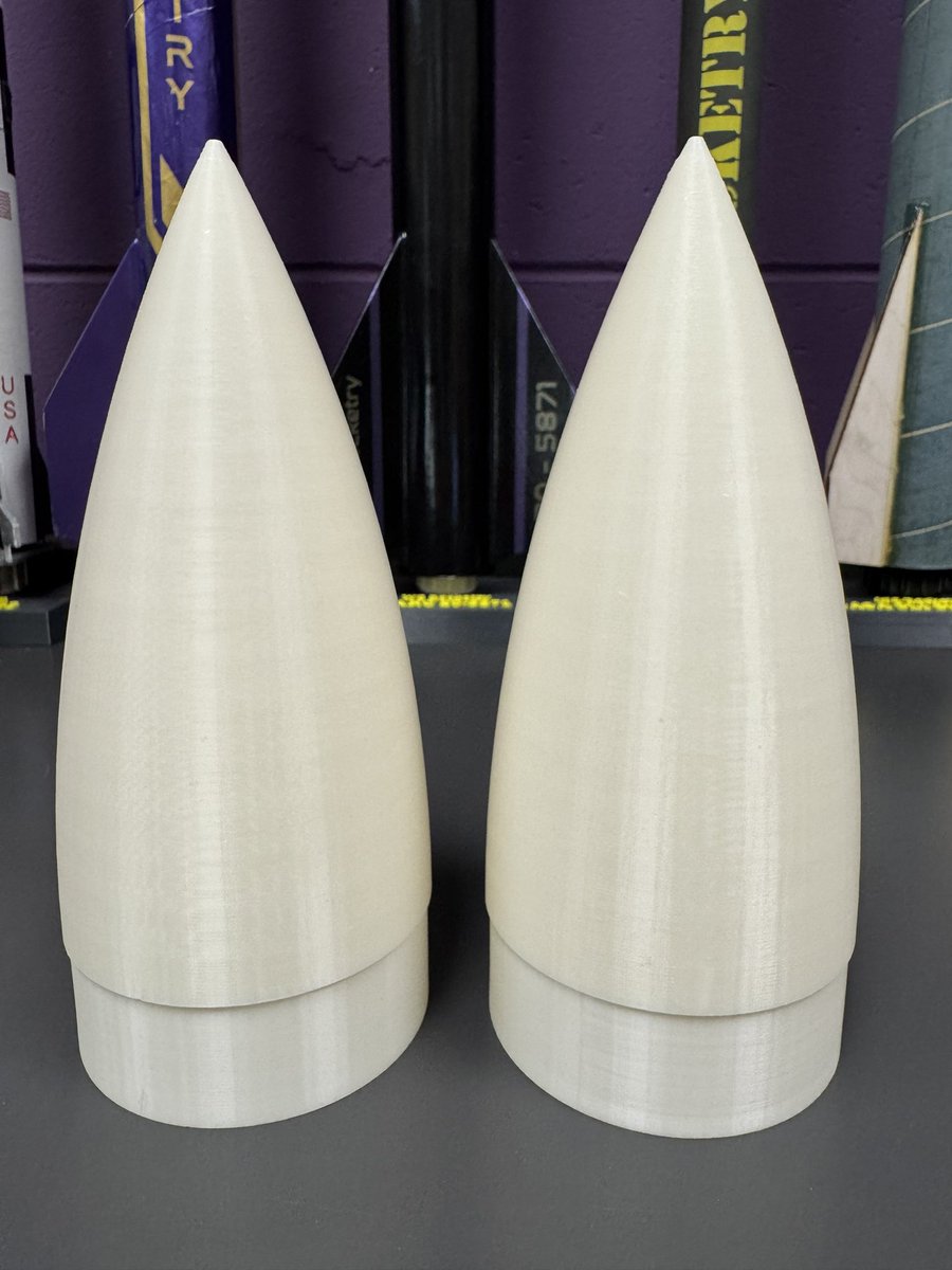 wc_rocketry's tweet photo. Nose cones have finished printing. Day 2 of Fusion 360 work designing the transition segments. #rocketcontest #arc25 https://t.co/vIOvPGoZPs