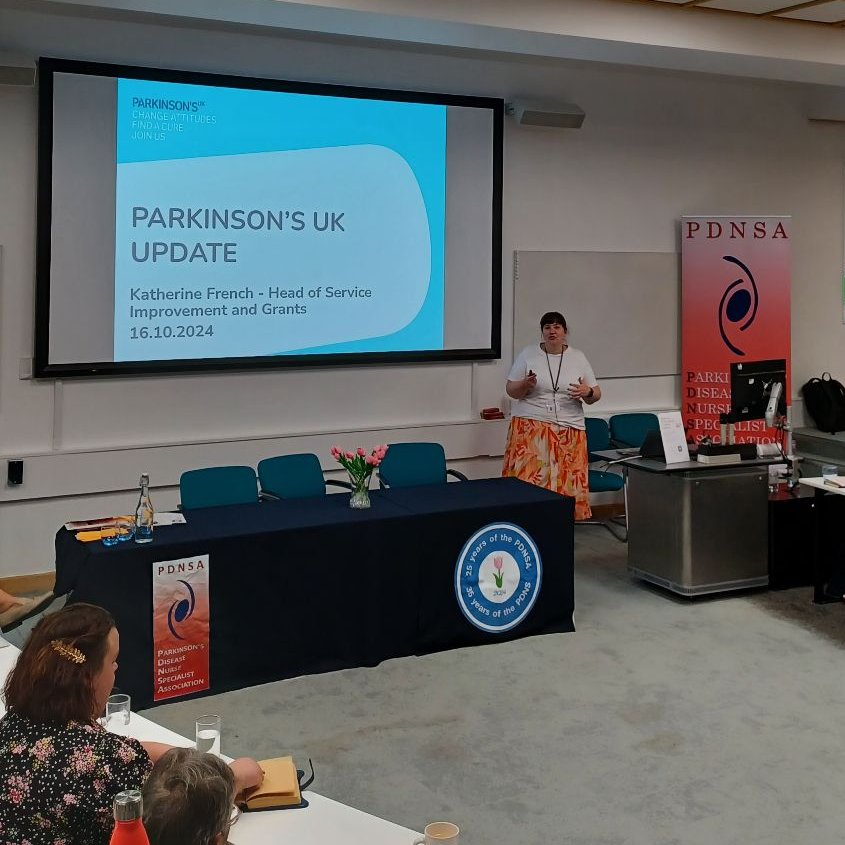 ParkinsonsEN's tweet photo. We're at the #PDNSA Conference today and tomorrow, celebrating 35 years of the Parkinson's nurse role and 25 years of the PDNSA🥳🎉

@ParkinsonsUK Head of Service Improvement and Grants @katfrench76 spoke on how the charity has supported the Parkinson's nurse role over the years. https://t.co/getIPHRQ0i
