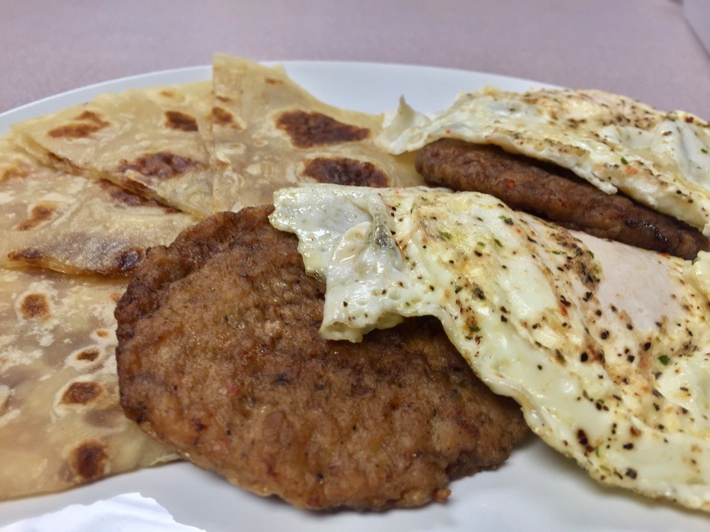 Lefse Breakfast Combo - Two eggs, choice of sausage, bacon, ham, Canadian bacon or potato sausage. Served with lefse with butter and cinnamon sugar.

Stop and dine-in with us or click here to order yours to go: bit.ly/LefseBreakfast…