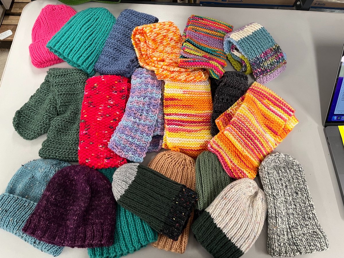 DGDistrict58's tweet photo. Stitches to Share is a local knitting organization. Each year, they donate beautiful hand-knit hats and scarves to District 58 students in need. Here are just some of the lovely items they donated this year. Thank you, Stitches to Share, for your donation! #dg58pride https://t.co/ul7gyVQecE