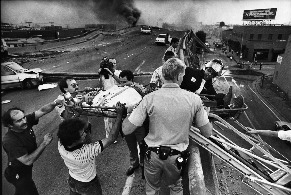 CHP_HQ's tweet photo. On 10/17/89, at 5:04 p.m, the Bay Area was rocked by the 6.9 Loma Prieta Earthquake. 63 lives were lost &amp; thousands were injured. CHP &amp; local heroes performed daring rescues, including the one captured in this Pulitzer-winning photo of the collapsed Cypress Structure. #LomaPrieta https://t.co/MYJN0tHwOb