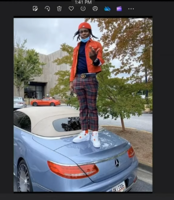 ThuggerDaily's tweet photo. The State presented this picture of Yak Gotti standing on YFN Lucci's car at Lenox Mall. Dennis testified to Yak Gotti being in out of prison, prompting a mistrial motion from Doug Weinstein. 
https://t.co/CUXqy1LiEj https://t.co/pgg4KUwusr