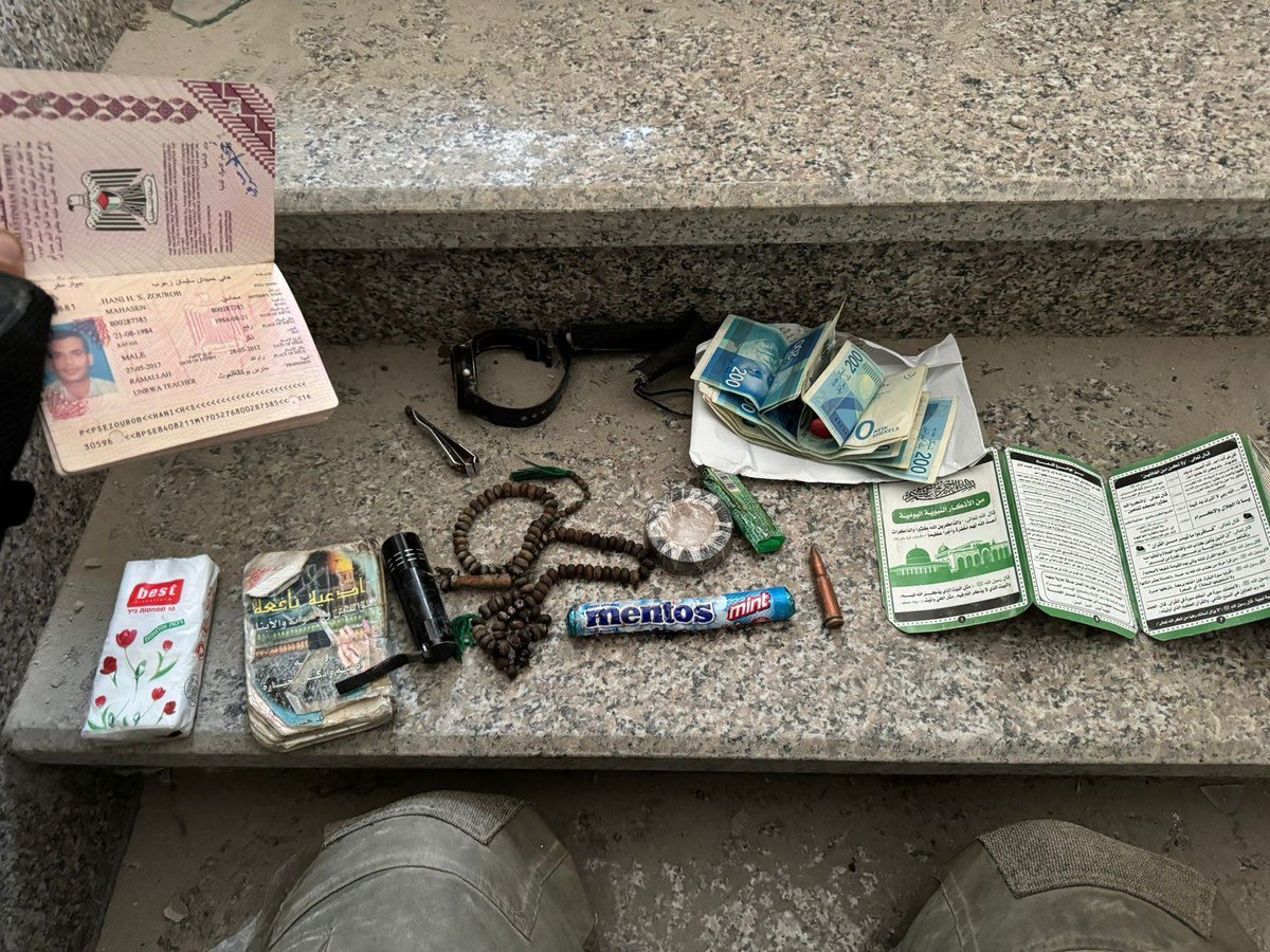 Mentos, money, an AK-47, a lighter, and a UNRWA employee ID: this is what was found on the body of the arch-terrorist Yahya Sinwar.