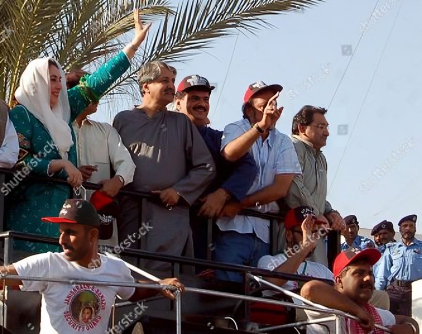 A_B_Raees's tweet photo. 18th October 2007 Archives: A Cherished Memory of My Father, Late #Hanif_Raees, Standing Proudly On the Truck of Our Fearless Leader, Shaheed Mohtarma Benazir Bhutto, While Fulfilling His Duty as a Devoted Janisar-e-Benazir. His Dedication to Democracy Will Always be Remembered. https://t.co/KI2RtGkwWQ