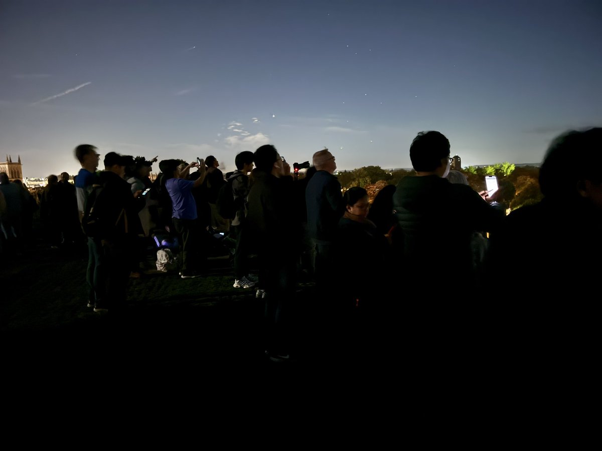 With lots of people on the Castle mound in Cambridge looking at comet C/2023 A3 (Tsuchinshan–ATLAS) over the city.