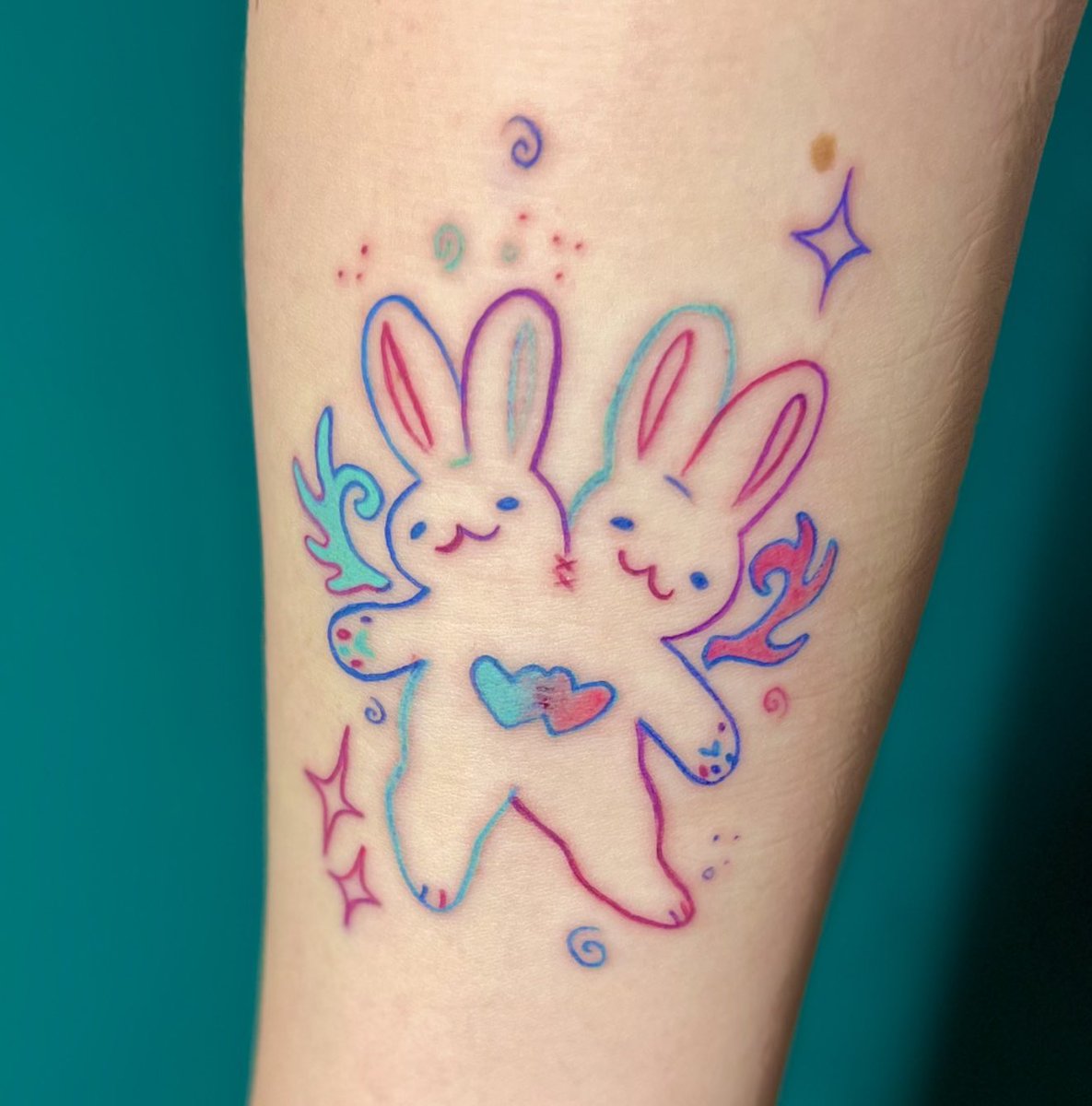 Vintiis's tweet photo. I don’t post my tattoos here often but doing these is important to me, so, here’s a bunny tattoo I did this summer! I’d love to design more of these :) 

#tattoo #tattooart #tattooartist #art https://t.co/lVlLb4lNiu