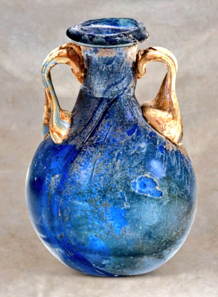 HawkeJon's tweet photo. #Roman blue #glass Amphoriskos (circa 1st Century AD. 
3 1/4 in. (8.2 cm.) high
#AncientGlass #artwork #Art #History https://t.co/34goFf6sbp