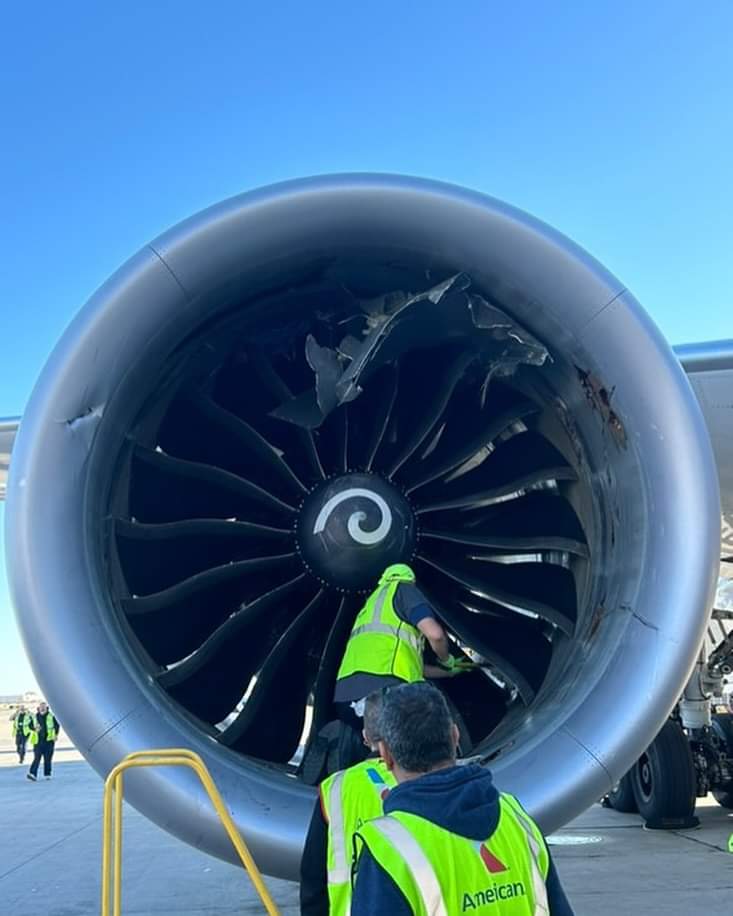 aviationbrk's tweet photo. American Airlines 787 ingests a cargo container into its right engine while taxiing at Chicago O’Hare International Airport.

It's reported that a ground vehicle towing the containers crossed a taxiway when the jet blast of a A350 blew one of the containers towards the 787.

The FAA said in a statement, "The crew of American Airlines Flight 47 reported an engine issue while taxiing to the gate at Chicago O’Hare International Airport around 4 p.m. local time on Thursday, October 17. The passengers deplaned normally. The Boeing 787-9 was traveling from Heathrow Airport in London."

📸 @WindyCityDriver