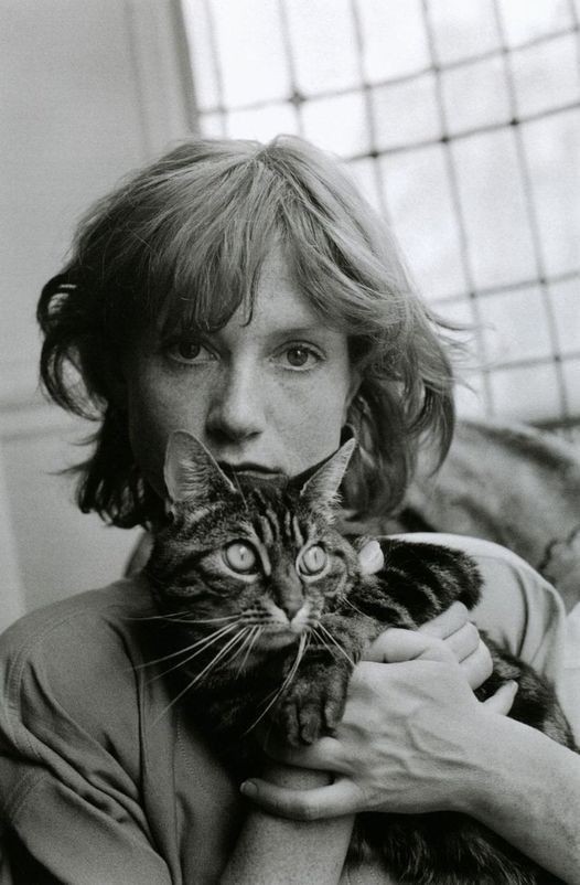 Isabelle Huppert with a cat, 1980s