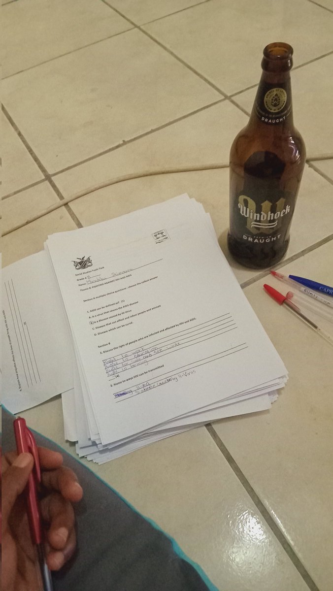 Marking my grade 4s. You need to have a protector. Stress is real.
