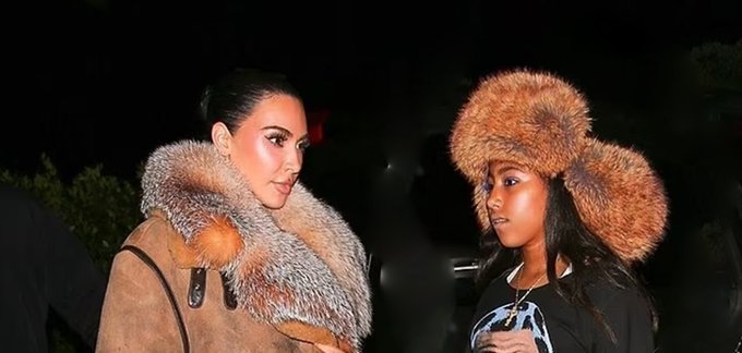 Kim Kardashian wraps up in a fur coat for a cozy sushi date with North West