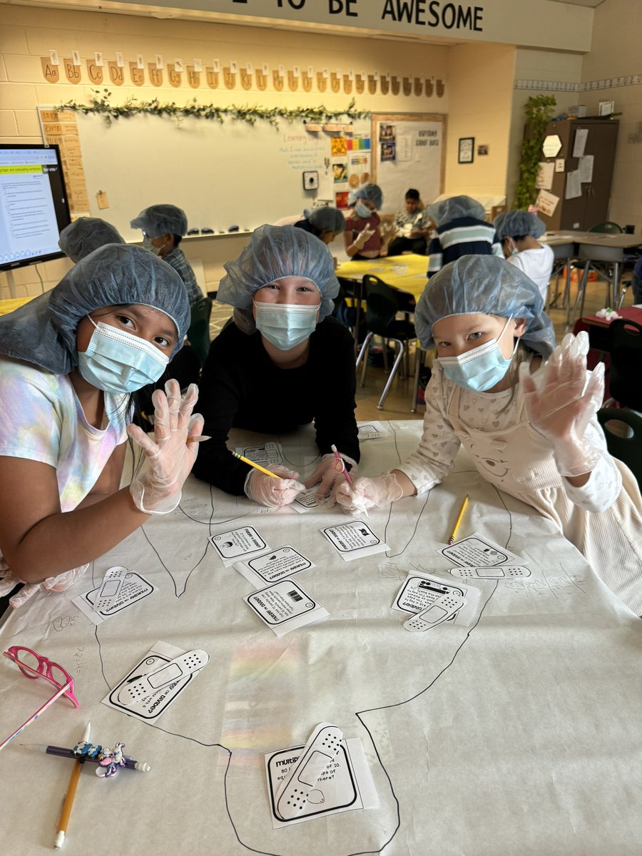 Mrs_Scanlon1's tweet photo. This past week our classroom turned into an operating room — as we became doctors to perform “surgery” on multiplication + division problems! 🏥🩺 

“Our great math skills saved our patients today!” @JamesACaywood @kimmott2 https://t.co/gIOtYWd4Kh