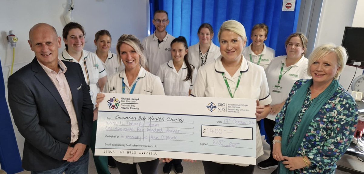 Was an honour to present Ward 12 at singleton hospital occupational therapists dept a cheque for £1400 in memory of our beloved mam .
A massive thanks to all who donated to the just giving page in memory of mam .
Not all heroes wear capes #Ward12 #OTs