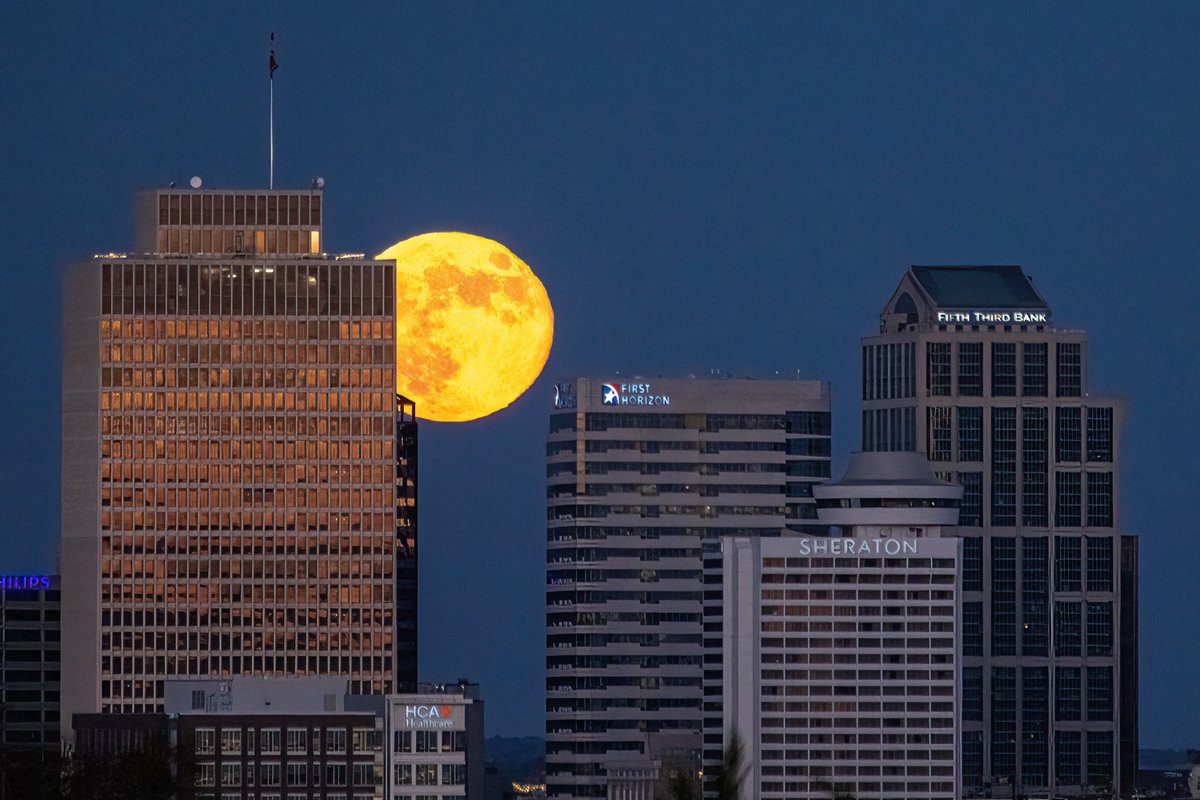 Full moon rising behind downtown #Nashville