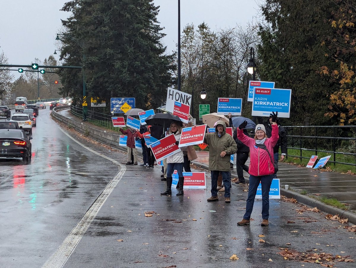 NorthVanFan's tweet photo. Now that's commitment! Two dozen people coming out in the rain to support @KirkpatrickWVC including the previous MLA and previous mayor of West Van. #bcpoli https://t.co/Sa98ZYxLgh