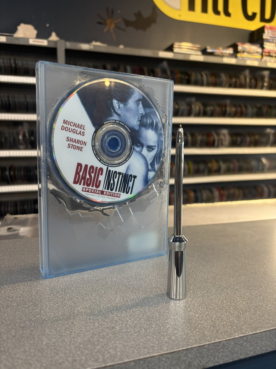 Signing my divorce papers with the Basic Instinct ice pick pen.