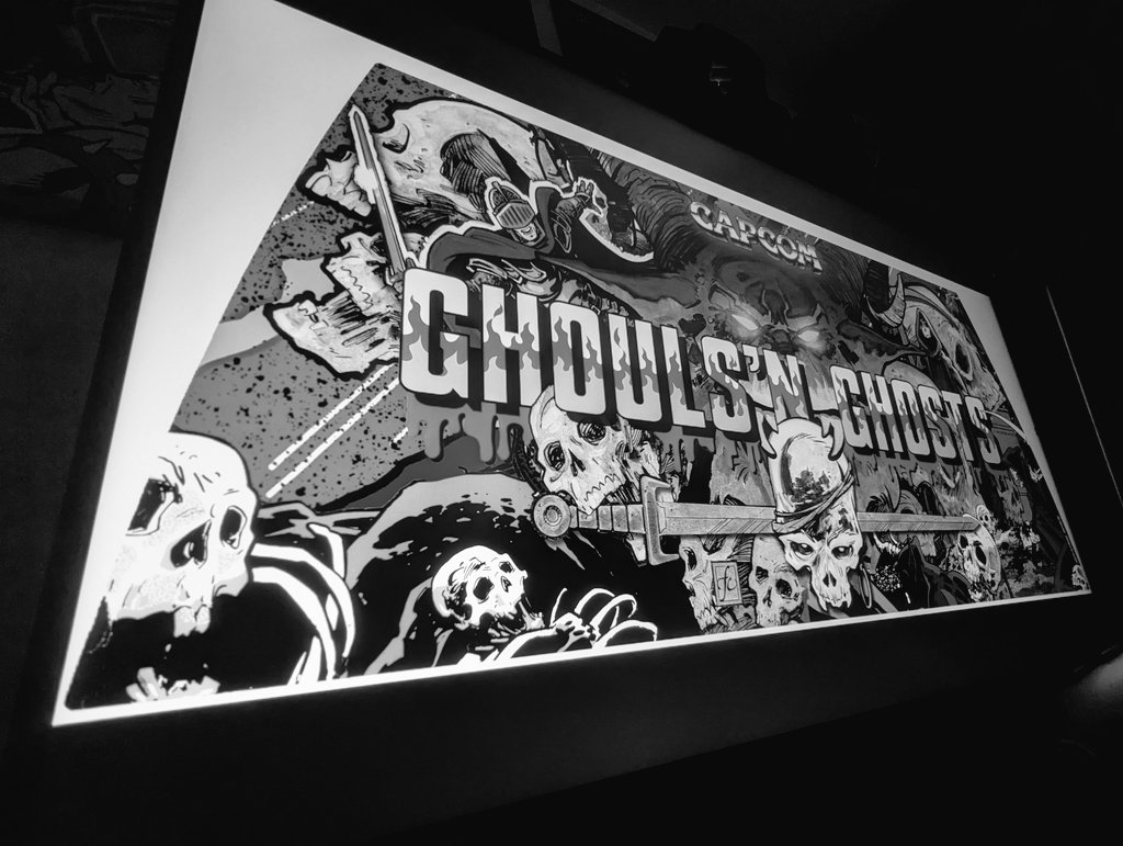 RannySnice's tweet photo. I want to thank @MrGamingRetro for his suggestion of darkening the background a little so that the "Ghouls' N Ghosts" logo stands out more prominently. I feel like this is what it needed and I am calling this done! #Sega #CandyCab #BlastCity #VersusCity #NetCity #Capcom #Arcade https://t.co/a4Mq0nwukM