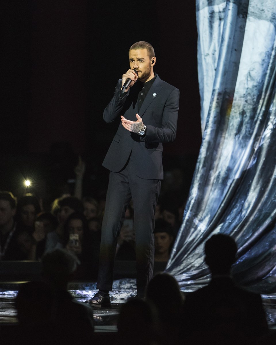 BRITs's tweet photo. Remembering Liam Payne, who graced The BRITs stage with unforgettable performances and moments that will forever be part of our history. From One Direction’s rise to his own solo journey, Liam’s talent left a lasting mark on the music world. Our thoughts are with his family, friends, and all who loved him.