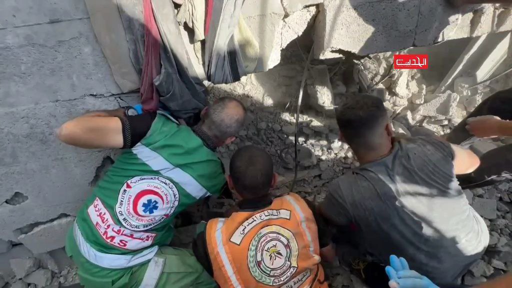 Search operations for survivors trapped under the rubble of house bombed by lsraeli warplanes in northern Gaza Strip.
