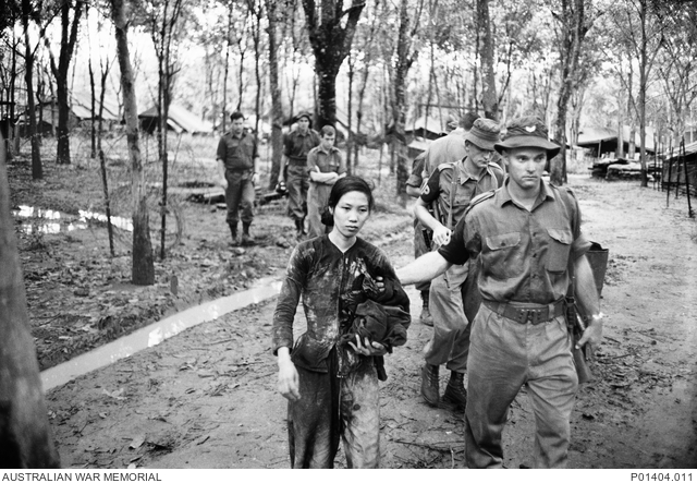 Description
To Thi Nau, a 23 year old Viet Cong woman prisoner captured in the Nui Dinh Hills with a radio. She was subsequently proven to be a National Liberation Front cadre active in its propaganda, indoctrination and intelligence gathering. After being captured, she was inter
