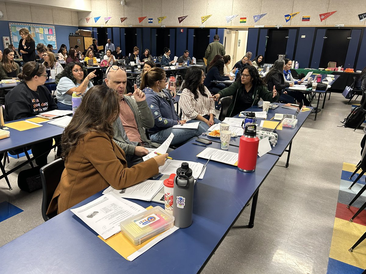 Teachers, Coordinators, and Administrators from Huntington Park and South Gate Network of Schools analyzing student work to support students making sense of and persevere in solving complex math problems.