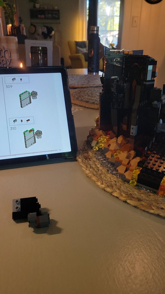 TheReplimat's tweet photo. As I sit here assembling the dark fortress, I was thinking about how @Tyranicus has the Tower of Orthanc surveying his home from a high shelf. And I'll be jiggered...our two cities are only 34 miles  off from the distance, as the crebain flies, between Isangard and Barad-dûr 🤓 https://t.co/RcZZ3HYa57