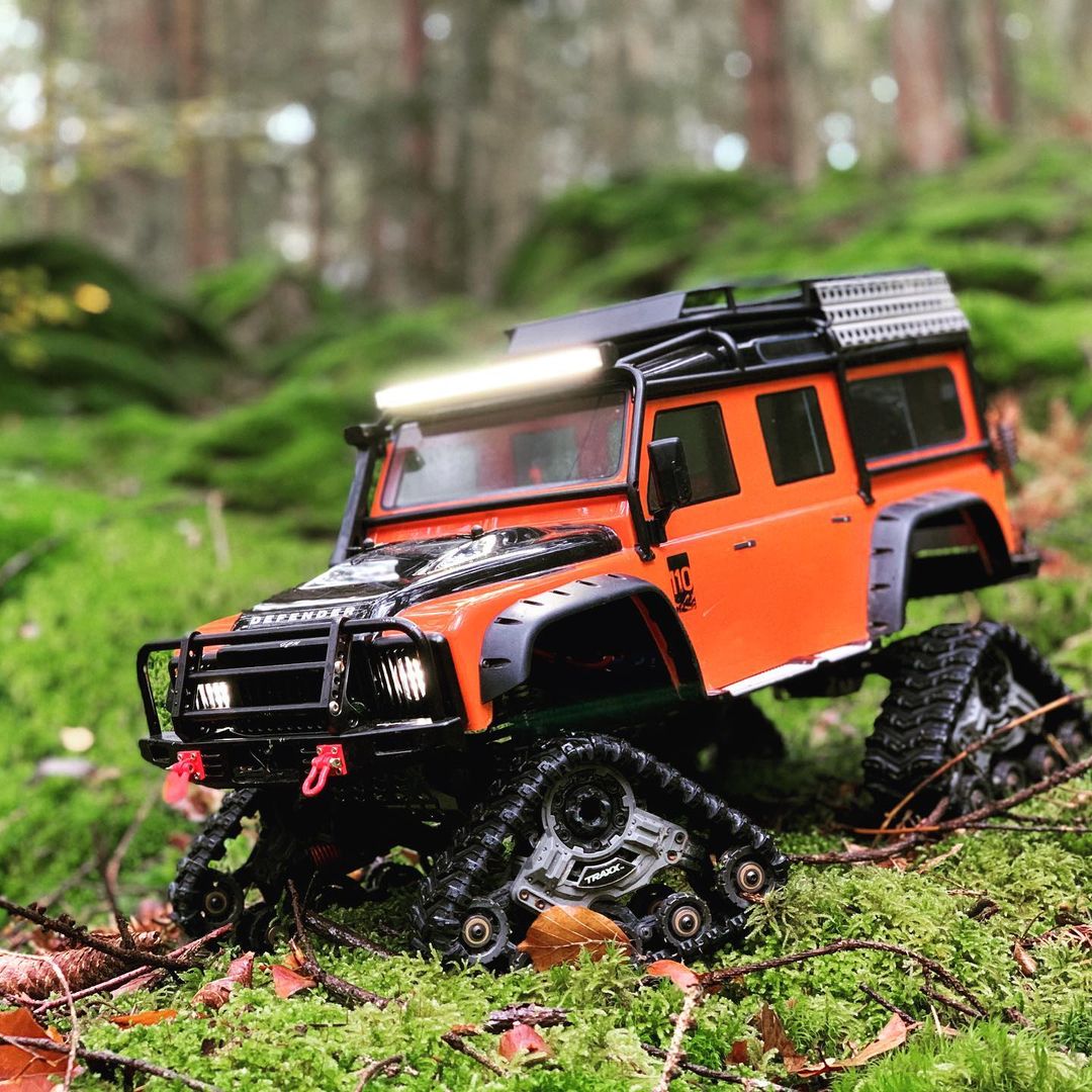Traxxas's tweet photo. Traction upgrade!! 🙌🏼 https://t.co/5HmXZ0ETMv
Add a set of Deep-Terrain Traxx to your #Traxxas TRX-4 crawler &amp; take on the great outdoors! 🧡

[Part # 8880] #TRX4Traxx
[[Model # 82056-4]] #TRX4Defender
#FastestNameInRadioControl #RC
#TRX4Explore
#TraxxasFanPhoto 📸: hfmodellsport https://t.co/sJIBr3HTFQ