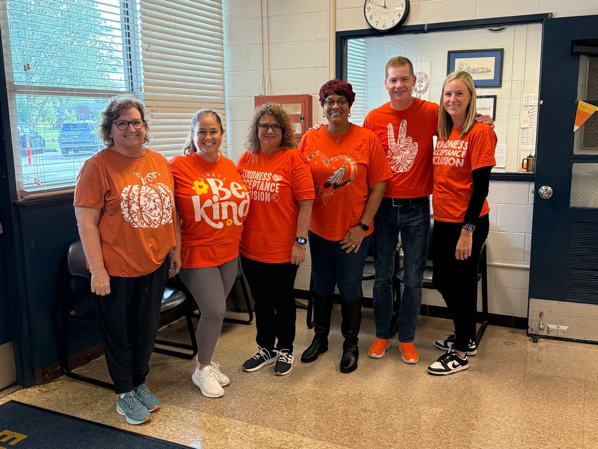 Our office staff represented on #UnityDay with their orange!