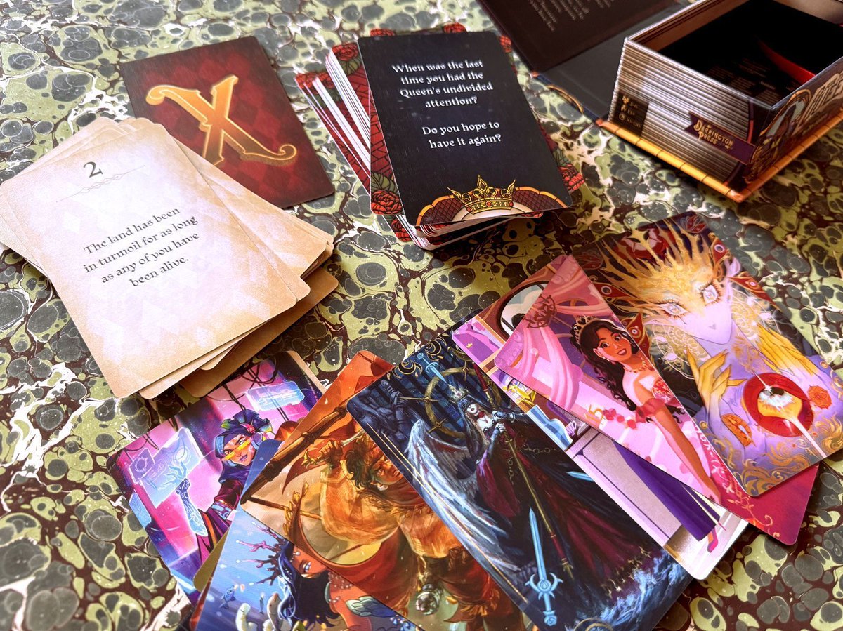 Knave_of_cups's tweet photo. NEW IN THE SHOP: card-based roleplaying game FOR THE QUEEN by @muscularpikachu 👑 Accompany your monarch on a dangerous journey, reveal your story, decide her fate 👑 NEWEST edition includes 25 tarot-inspired Queens, from fae royalty to modern business moguls, in a box w a ribbon https://t.co/5bWm2d7Jev