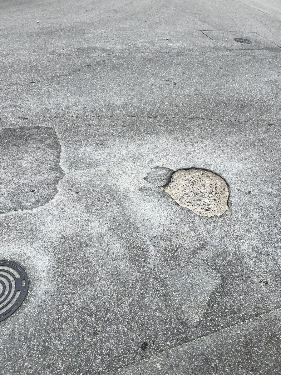 Samyg15's tweet photo. Can we please, please fix these things. I know our tax dollars must fund Ukraine, but is there some to fix our roads. It’s a damn shame. Corner of 127th and 224th street SW. https://t.co/mfKvSIiAo8