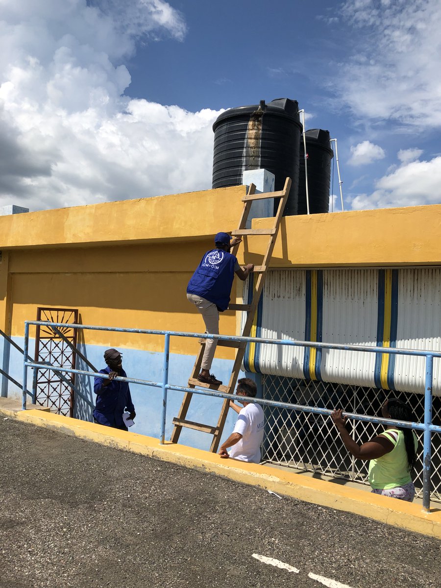 IOMJamaica's tweet photo. The road to recovery is ongoing, and the UN including @UNmigration , remains committed to helping hurricane victims rebuild their lives. 🤝🌍 With support from @UNCERF IOM has identified another emergency shelter in Bucknor, Clarendon, for essential repairs🛠️🏠#RebuildStronger https://t.co/ZLtEJbPdZb