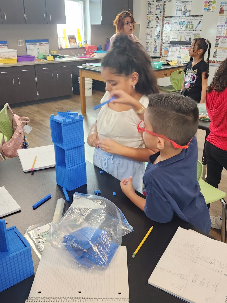 AlyssaAggie's tweet photo. Last week before Fall Break, 2nd graders reviewed place value and combing materials for a new purpose by representing mystery numbers then combined the base 10 blocks to build towers! #pisdmathchat @LFSmithElem https://t.co/WopRNt4cJS