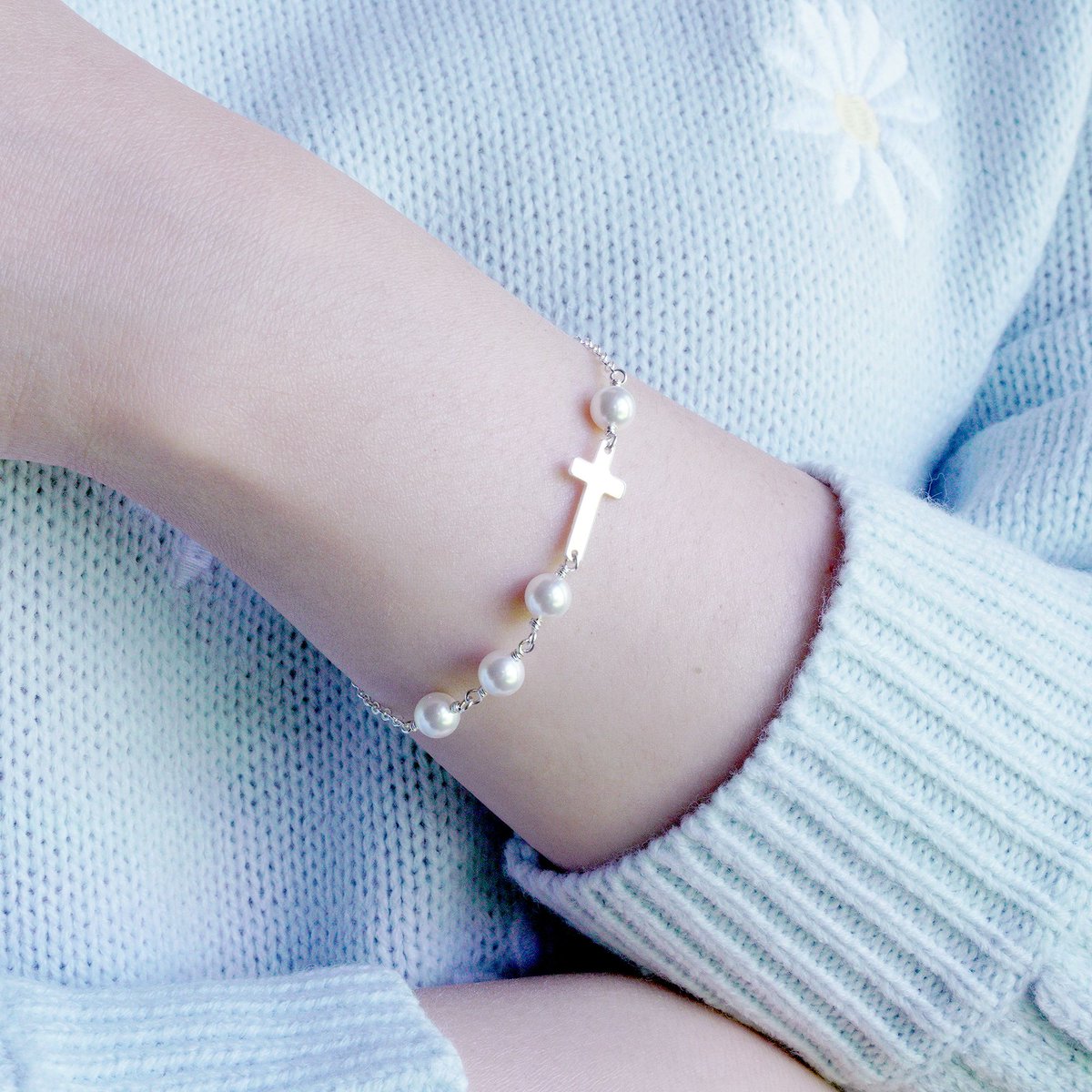 I love pairing this sterling silver bracelet with my everyday outfit. It features medium-sized crystal pearls and an elegant cross pendant! buff.ly/4eQiJrW #handmadejewelry #bracelet #crossbracelet #pearlbracelet #giftsforher #giftideas #handmadegifts #customjewelry #etsy