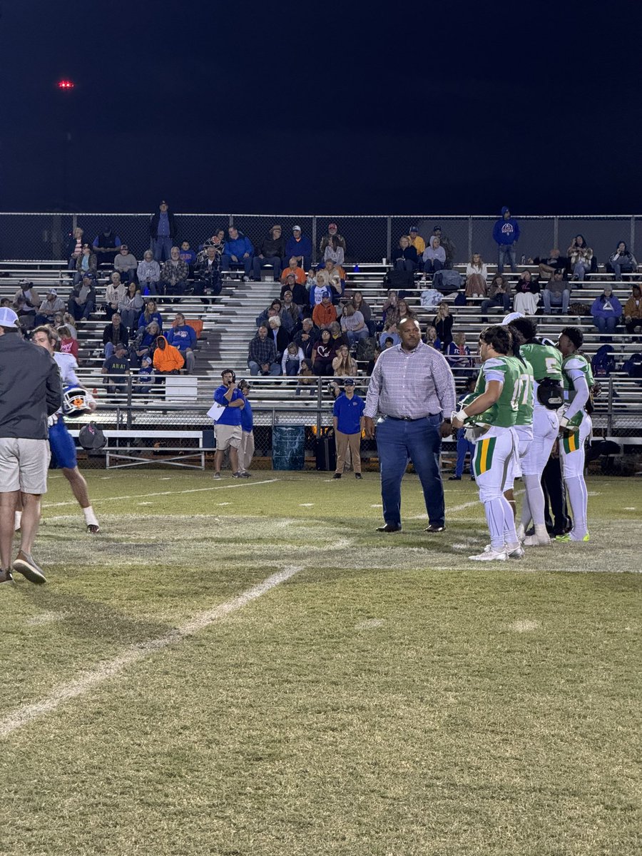 Suwannee captains with honorary captain Senator Simon