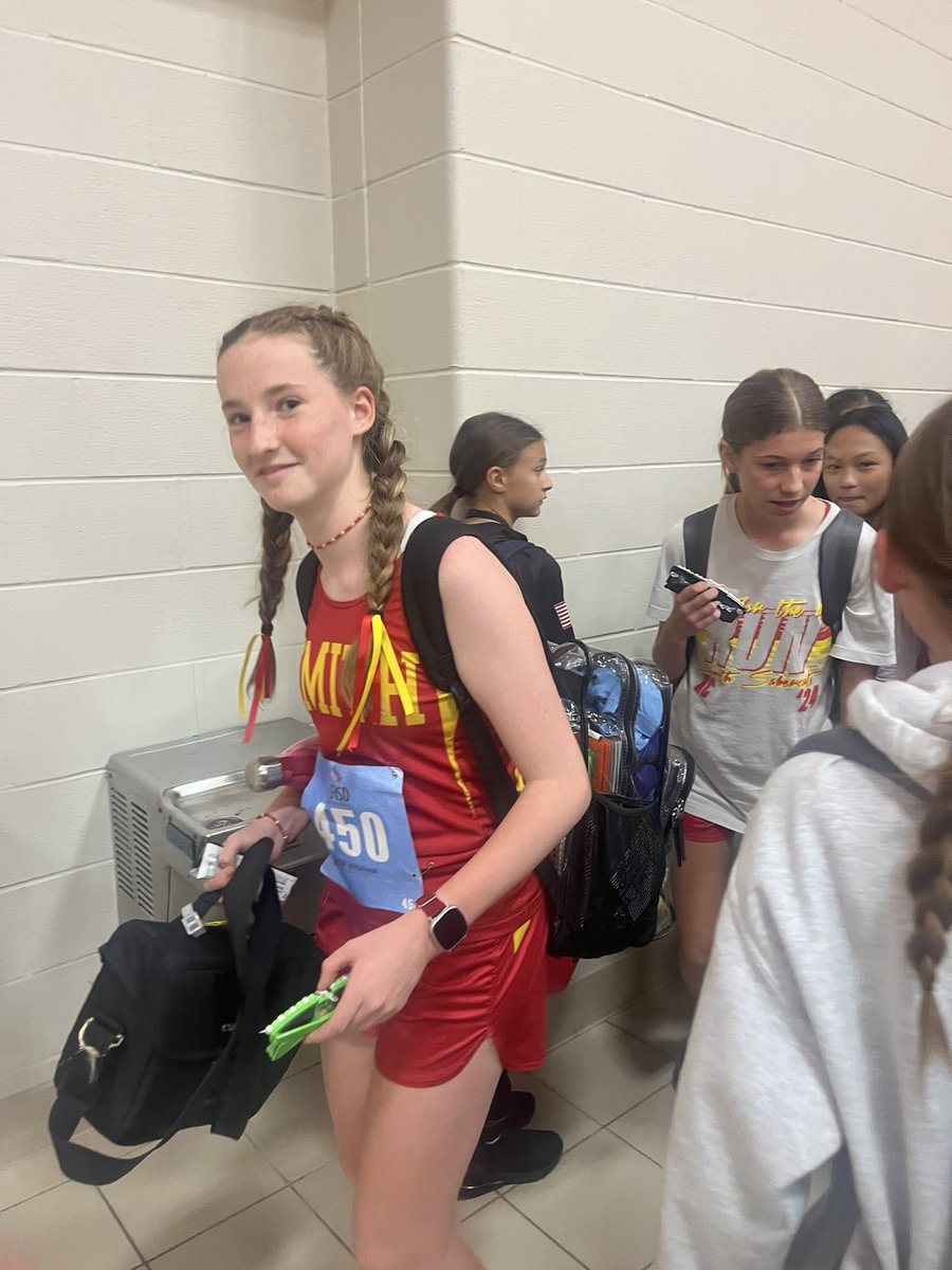 Showing up for the next wave of Mustang runners! High school XC team gave out shades and encouragement to Smith runners before the district meet.