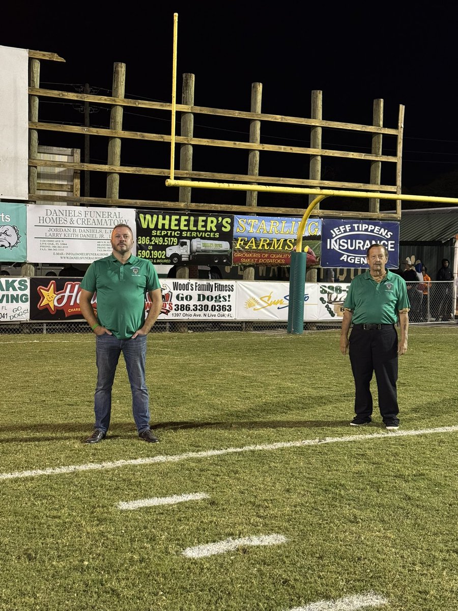 Tyler Chambliss and Tom Daniels recognized at the conclusion of the first quarter as the new Hall of Fame inductees.