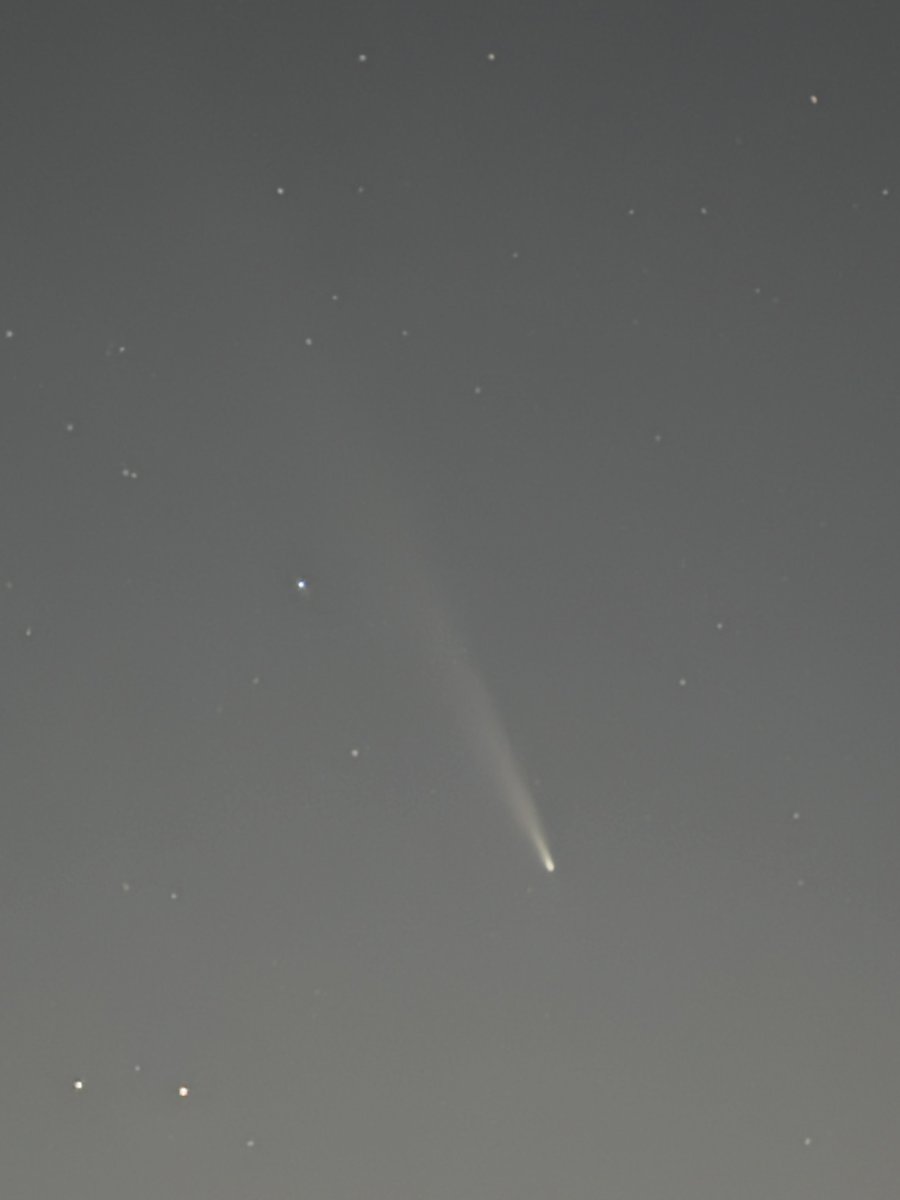 Great comet viewing right now #cincywx, but you must wait for your eyes to adjust. A telephoto lens on a phone makes it easier to see too, like this. #CometATLAS