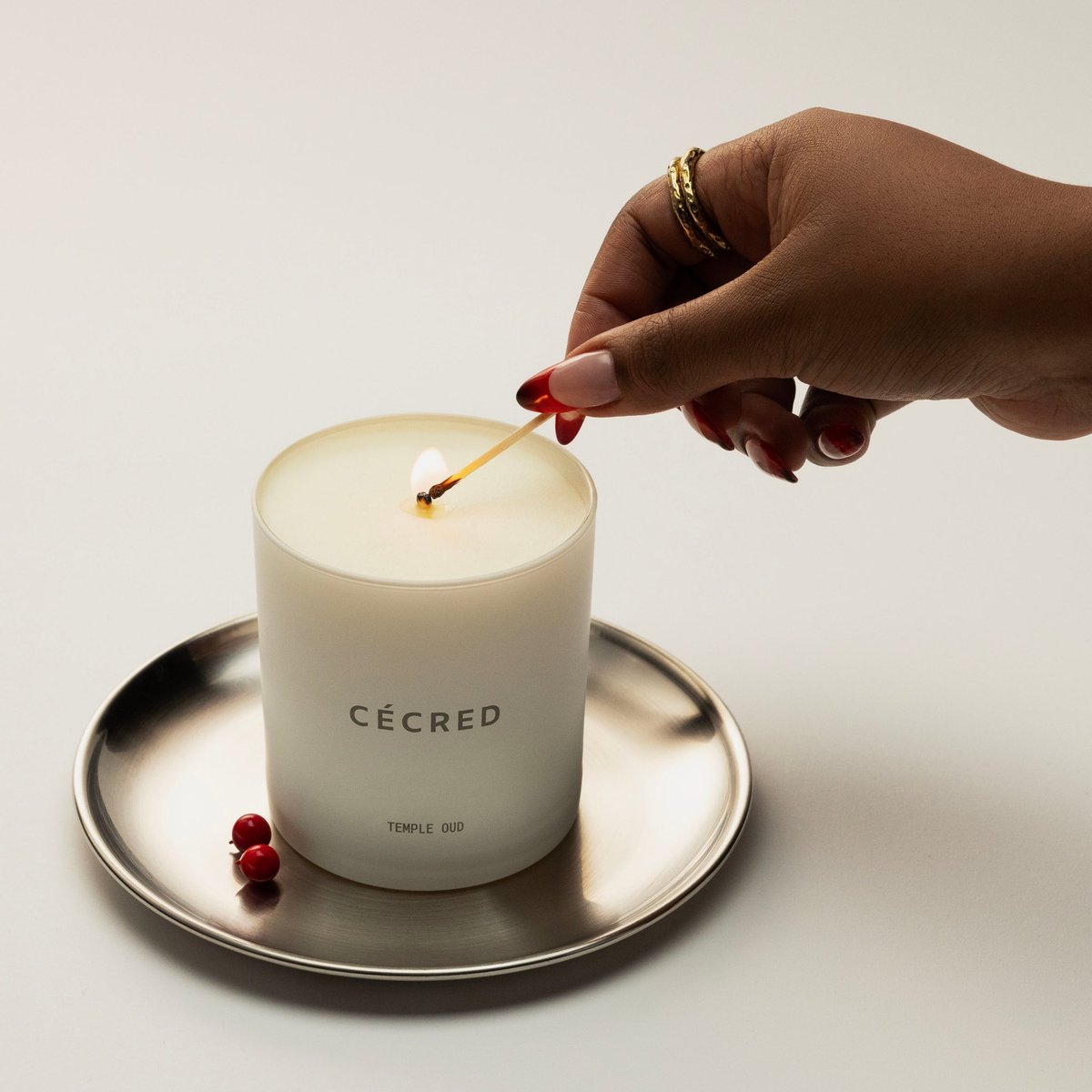 CECRED_OFFICIAL's tweet image. Candle lit, vibes set. Our limited-edition TEMPLE OUD CANDLE fills your CÉCRED space with rich, complex notes of oud, Australian sandalwood, and warm musk. And not to mention, it’s the perfect gift for the holiday szn.