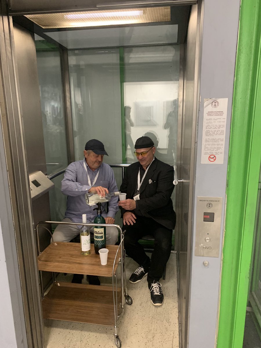 BlueChipArt1's tweet photo. Invited onto a friends booth for a drink of Parlinka &amp; he’s hijacked the disused lift Ady25 Galeria in Budapest thanks Istvan creative thinking https://t.co/59k0JqfJ3Z