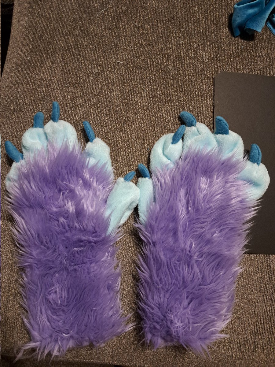 AwkwardMichi_'s tweet photo. Soooo I tried to make my own hand paws!!! Literally the first time sewing anything-
Adter like 20hrs of work they still have some gaps I gotta fix and just generally a LOT of jank but they're technically wearable!! https://t.co/msjNTX23Bd