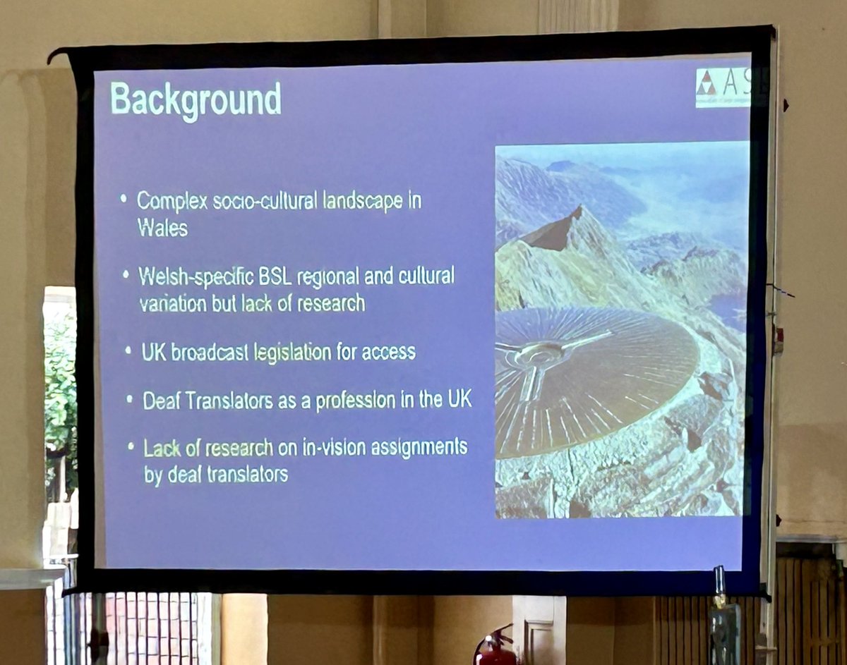 ASLIuk's tweet photo. Our first keynote speaker @foulkes_helen presents her research on #signlanguage #translation in Wales ๐ด๓ ง๓ ข๓ ท๓ ฌ๓ ณ๓ ฟ and explores how linguistic and extralinguistic knowledge of Welsh can affect #Deaf translatorsโ production of #BSL.
#ASLIConference2024 #ReframeResetRefresh https://t.co/kZcq1BqFi1